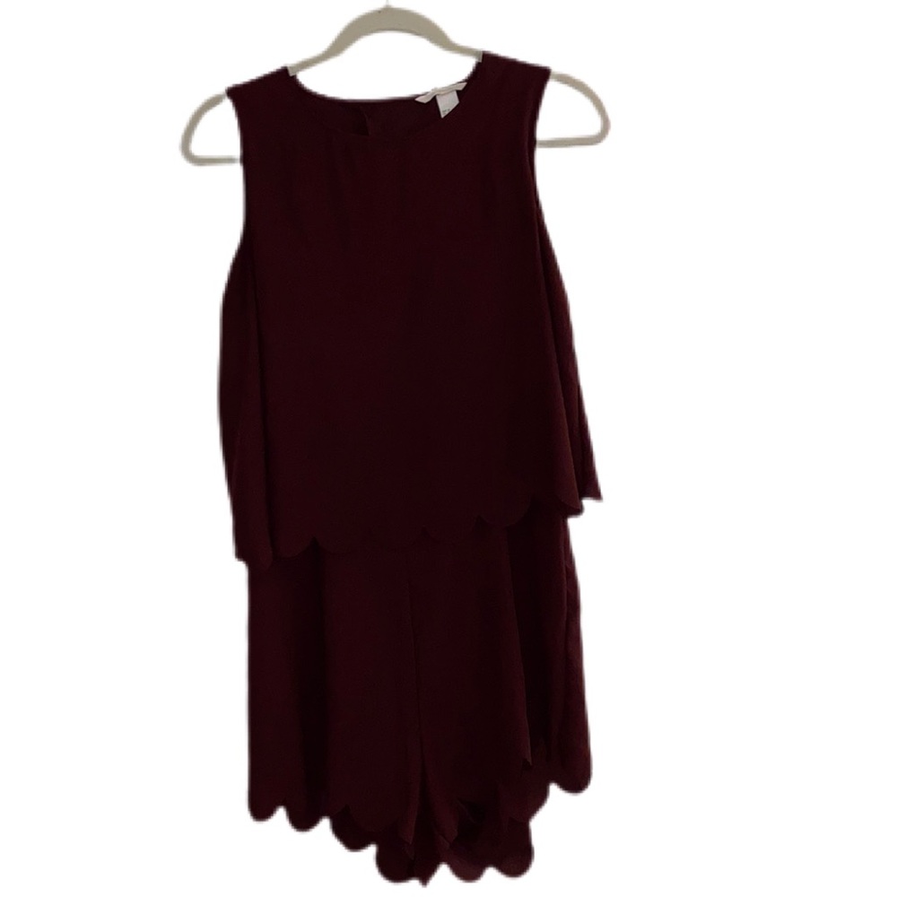 Purple H&M Romper. Cut out back. Super cute & comfortable. Size 10. Runs small.